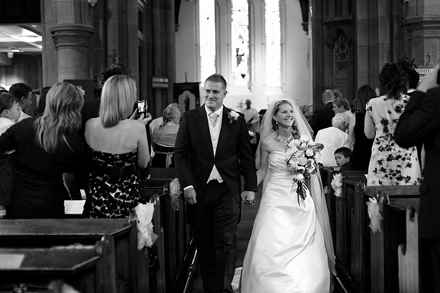 St Mary's Church, Garforth, bride and groom, aisle, church wedding photographers in Leeds
